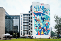 /uploads/posts/3917946628eb8027a5a5dd1f4c268e262d214449/thumbnails/Okopowa 59A_Home Invest_mural Przyszłość na Woli_ 2.png